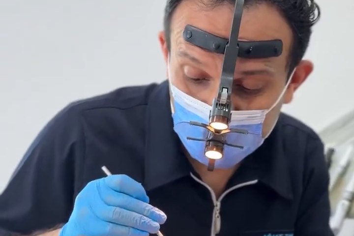 Our dentist at work during a treatment session